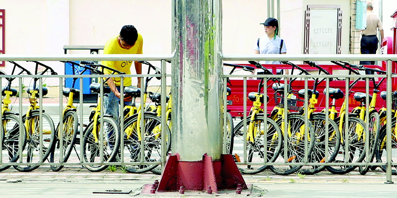 广州“禁投令”满一年 共享单车驶入正轨？