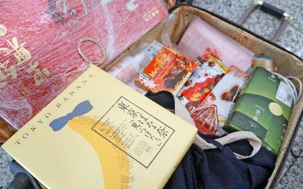 返乡过年,大家的行李装了啥?有零食也有花草